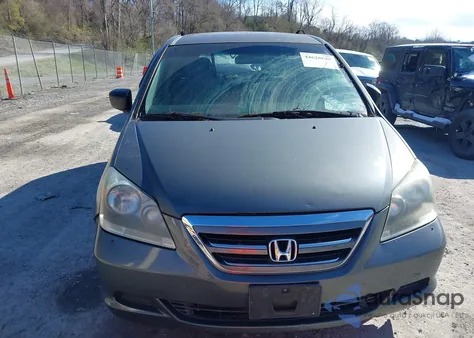 2007 Honda Odyssey Lx z USA, uszkodzony, nr VIN 5FNRL382X7B037283